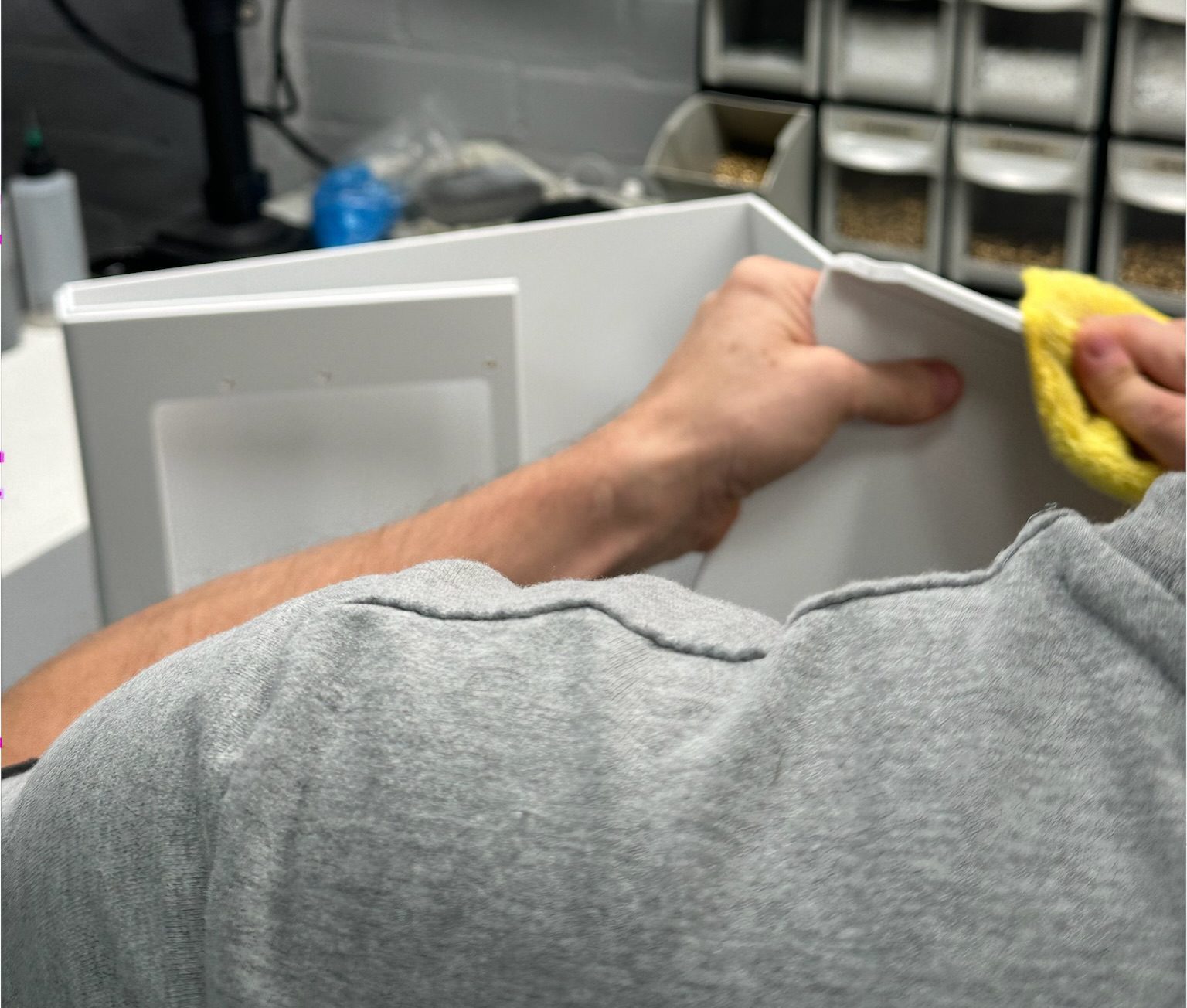 Man cleaning with cloth